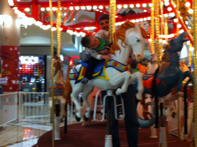 Vincent Rides his first Merry Go Round