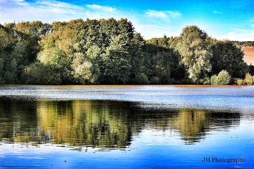 blue trees summer sky reflection green nature water beautiful river landscape pond natural vibrant peaceful sunny explore getty tranquil hdr gettyimages