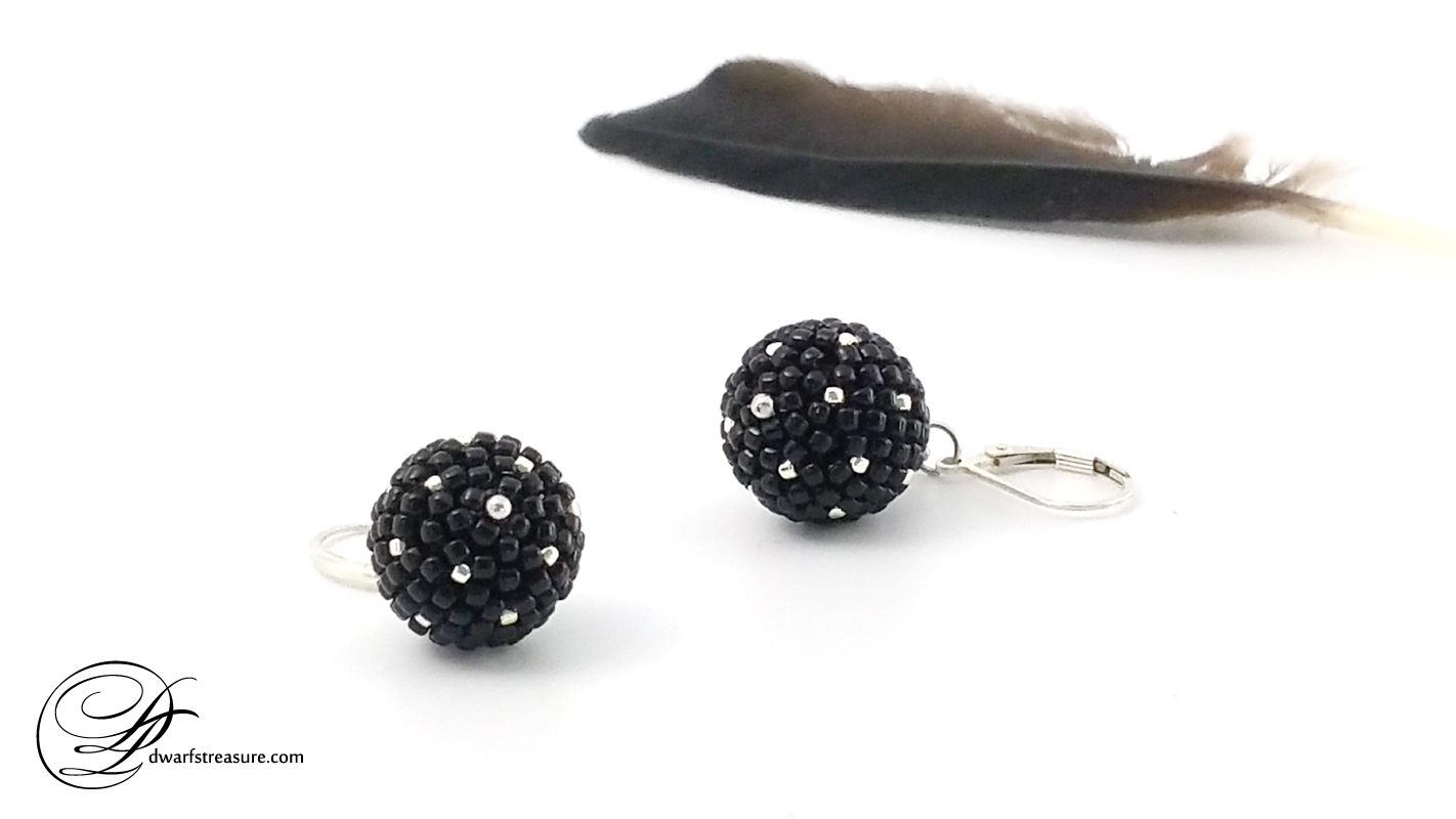 Elegant black beaded bead silver earrings and bird feather