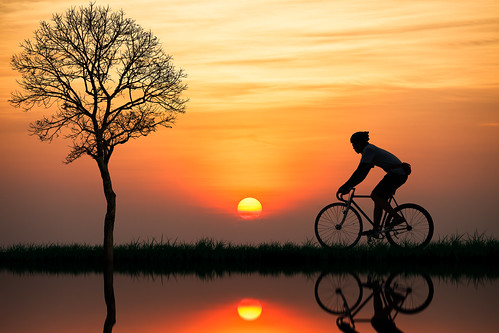 park travel autumn boy sunset summer sky people sun mountain lake man reflection guy beach sports water field bike bicycle silhouette sport yellow race speed sunrise thailand outdoors person evening cyclist tour ride riverside outdoor background hill wheels young journey shore cycle biking biker bicyclist leisure recreation rise rider vector active trat kokut