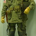 In WWII Paratrooper Combat Uniforms with M1 Helmet,2