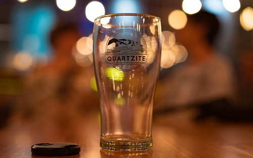 chewelahwa chewelah washington state brewery quartzitebrewingcompany beer social indoors speaker showing lights fixtures bokeh people event quartzite brewing company lens cap sonyphotography sony sonyphotographing a7ii sonya7ii ilce7m2 ilce sel50f18f fe50mmf18
