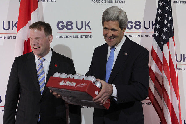 Secretary Kerry Receives a Case of Beer from Canadian Foreign Minister John Baird
