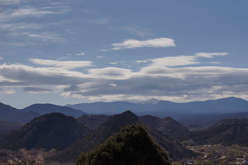 sky mountains clouds desert juniper embudo