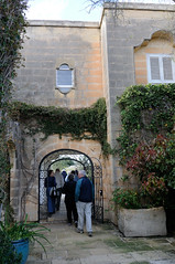 625-20100314-Malta-Il Bidnija Village-Ras Rihana House-group taking their leave via entrance gateway