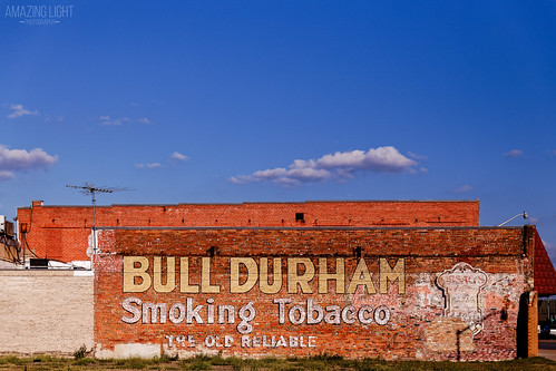 abandoned afternoon architecture beautiful blue brick bright brown building colorful decay giddings goldenhour leecounty outdoor ppl red rust street tan texas vintage wall warm white streetphotography sunny unitedstates