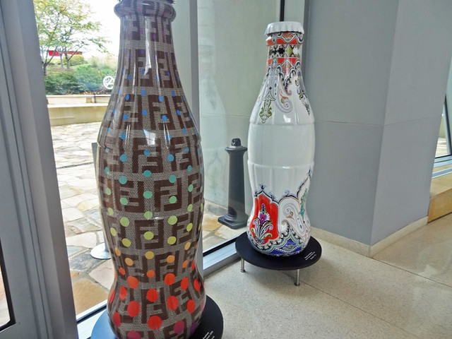 coke flavors around the world - bottle art