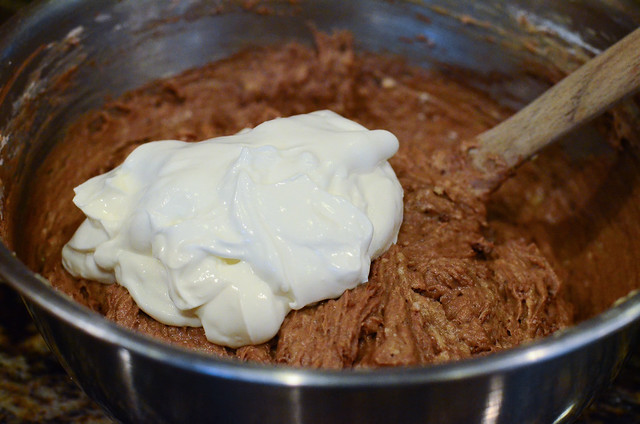 Sour cream is added to the mixing bowl.