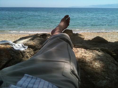 sea selfportrait beach water relax observation island foot sand rocks toes mediterranean view horizon leg towel greece shade barefoot vista trousers outlook breeze relaxation lying idle limb unemployed laziness pockets groundswell decumbent platania evia teetotaller observationpost