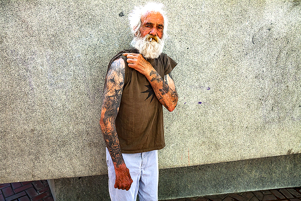 Man-with-lion-tattoed-on-right-arm--San-Francisco
