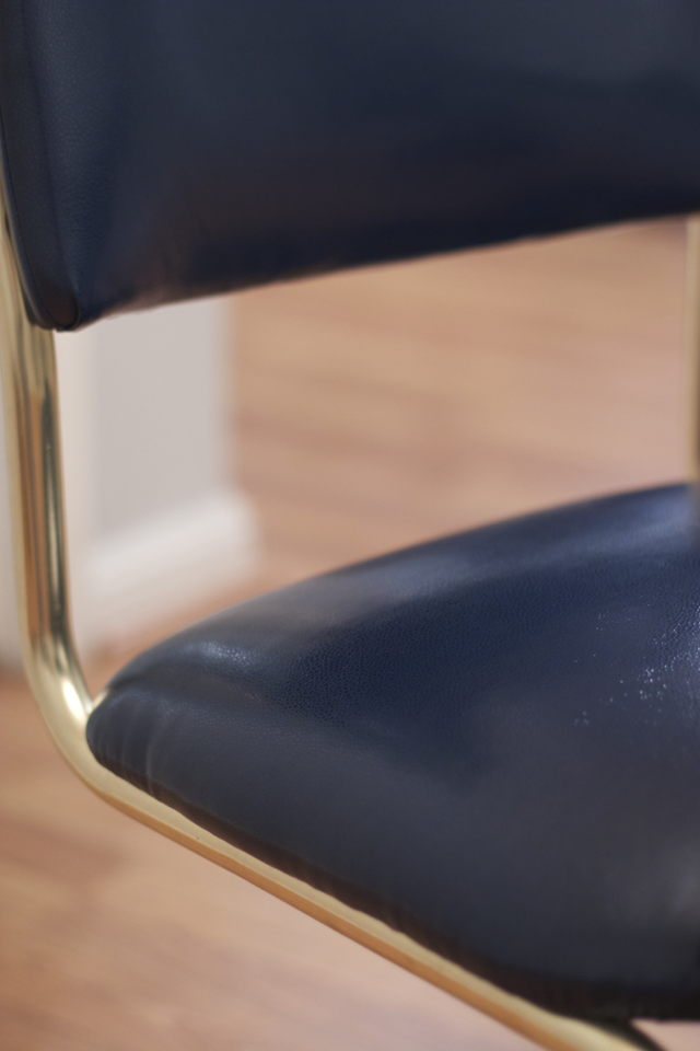 blue and brass dining room chairs