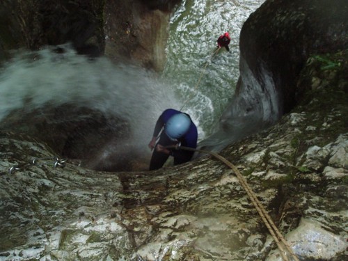 Sarah abseiling the big waterfall