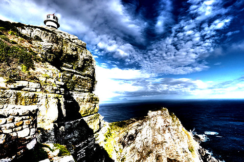 ocean above blue sky cloud lighthouse southafrica spring nikon rocks capetown cape capepoint hdr d90