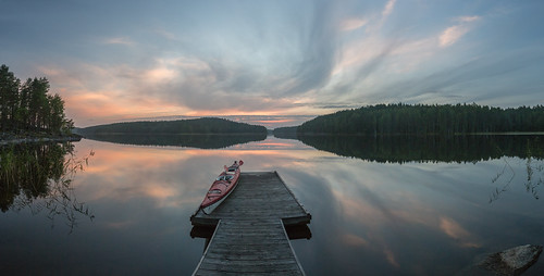 nationalpark jetty summer lake kolovesi sunset canoes finland