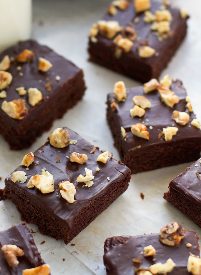 Super Fudgy Fudge Brownies - One bowl, dense brownies with a ganache style frosting and topped with toasted walnuts! #fudgebrownies #homemadebrownies #fudgybrownies #brownies | littlespicejar.com