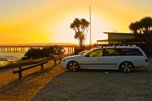 ocean road sunset sun tree ford car sunrise pier surf great melbourne falcon greatoceanroad lorne