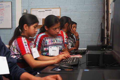 girls learning computer skills