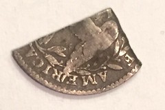 Quarter of a 1795 half dime reverse