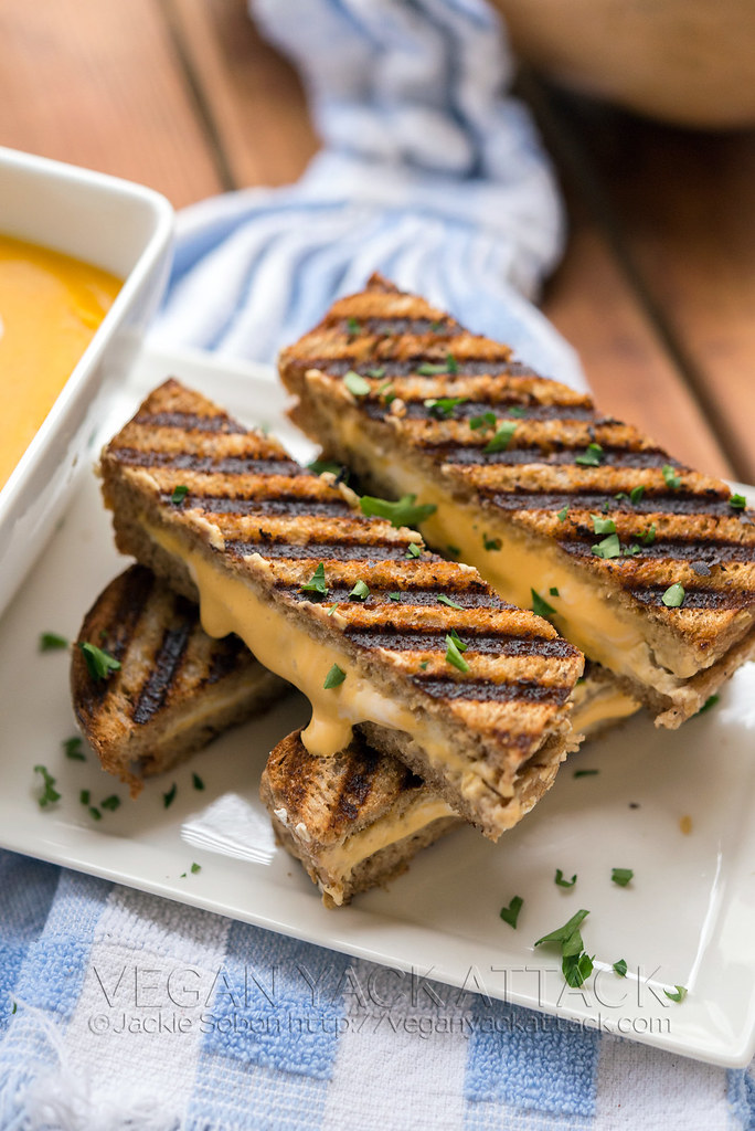 Close up photo of stacked, vegan grilled cheese sticks
