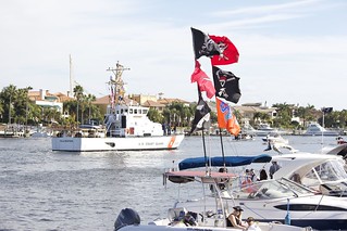 The crew of the Coast Guard Cutter Alligator patrols during the annual Gasparilla parade in Tampa, Fla., Saturday Jan. 31, 2015. Coast Guard, Coast Guard Auxiliary, Florida Fish and Wildlife Conservation Commission officers partnered with local law enforcement agencies to maintain marine safety during the event. (U.S. Coast Guard photo by Auxiliarist Franco Ripple)