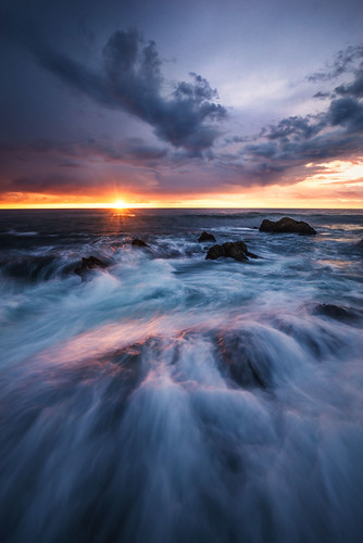 ocean light sunset sea sun seascape storm beach water rock clouds landscape star waves glow pacific montanadeoro oro