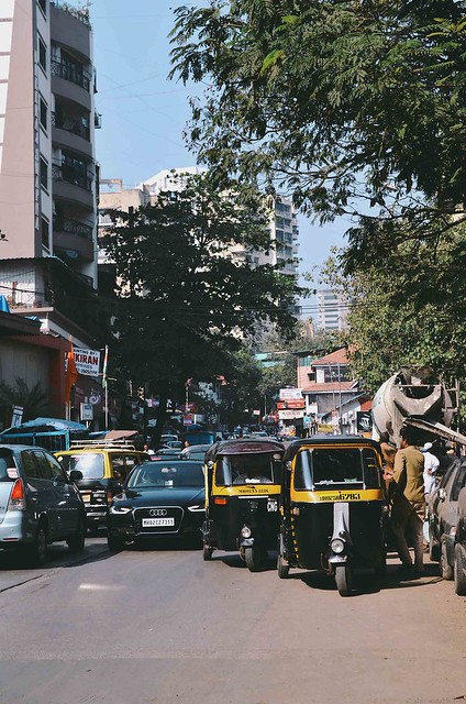 Mumbai Busy Streets and Rickshaws | A Brown Table