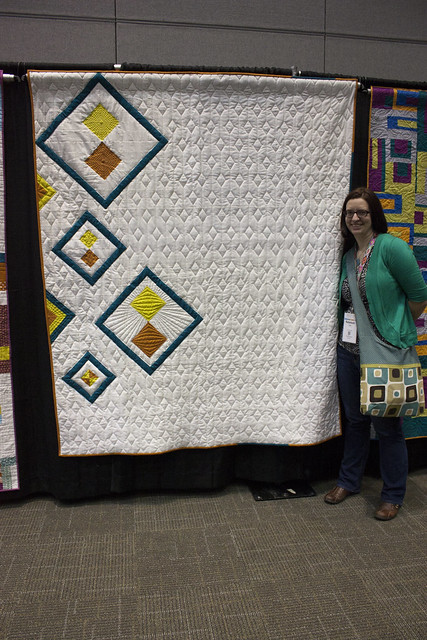 Quilt Con Charity Quilts_Rebekah with the DAMQG quilt