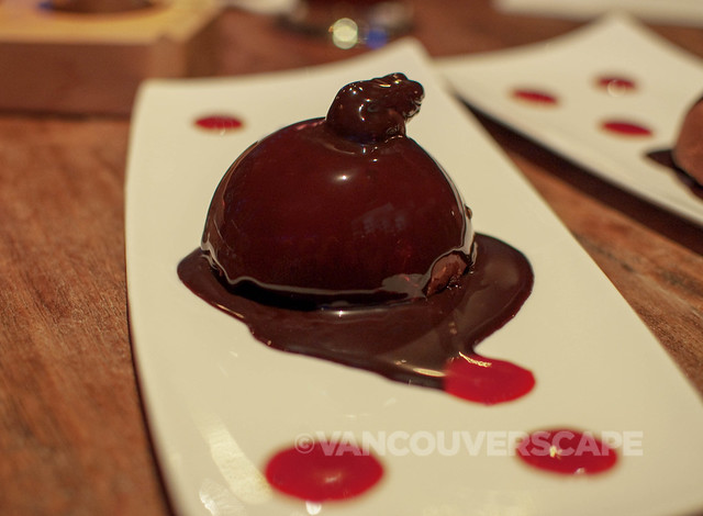 Devil's Bomb/Dark chocolate mousse, macerated cherry filling, chocolate chunks, dark chocolate glaze, raspberry coulis