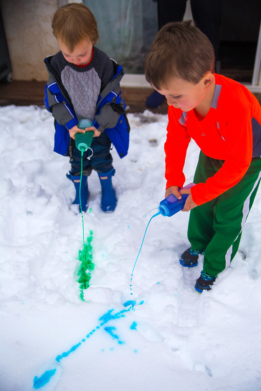 Toddler Painting in the Snow