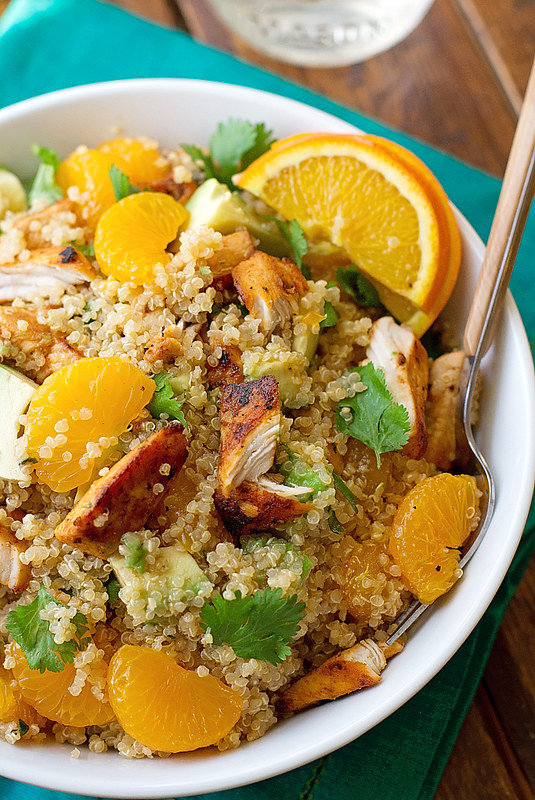 Light Citrus Chicken Quinoa Salad - A light and healthy citrus salad with creamy avocados, chunks of white meat chicken, mandarin oranges, and fresh cilantro. This chicken quinoa salad is so filling and still lighter on the calories! #chickensalad #quinoasalad #chickenquinoasalad #lightsalad | Littlespicejar.com