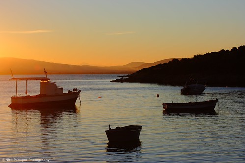 light sunset sea sky orange sun water contrast landscape boats greece thessaly orangeskies silhouettesshadows