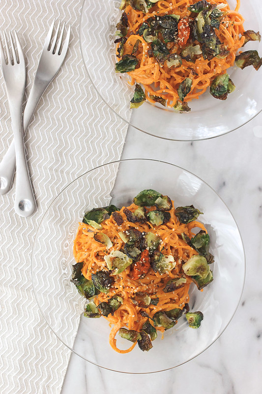 Butternut Squash Noodles with Harissa Cashew Cream and Crispy Brussels Sprout Chips // @tastyyummies // www.tasty-yummies.com