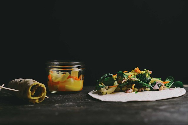 green chickpea salad, pickled black radish and turmeric root, turmeric almond cream in a wrap | A Brown Table