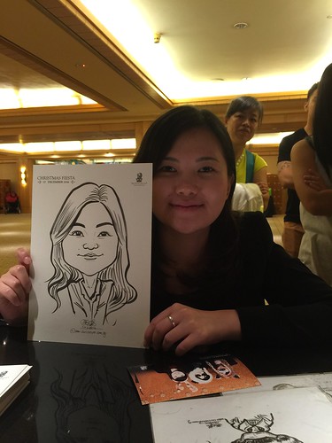 Caricature live sketching for Ritz Carlton Christmas Fiesta 2014