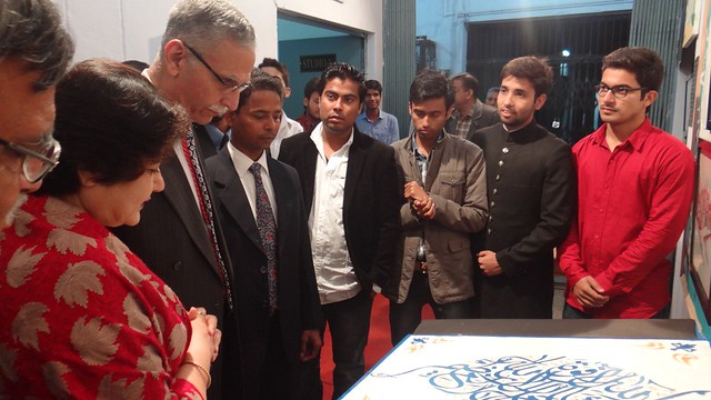 AMU Vice Chancellor looking at a heritage piece of art displayed by architecture trainees.