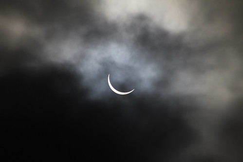 93% Solar Eclipse through the clouds