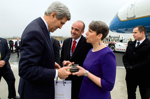 Ambassador LeVine Presents Secretary Kerry With Box of Chocolates As He Departs Switzerland En Route to United Kingdom