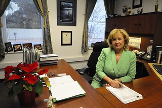 Teddie Thorogood, chief of resources and planning for the Coast Guard 5th District in Portsmouth, Va., works at her desk Tuesday, Jan. 13, 2015, to ensure funding for operational Coast Guard units. While Thorogood has long-range oversight of projects like moving Coast Guard sectors, establishing new buildings, recapitalizing facilities and moving personnel billets, her determination and enthusiasm have a positive impact on people. (U.S. Coast Guard photo by Petty Officer 3rd Class Nate Littlejohn)