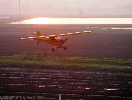 california sunset plane afternoon rice fields norcal marysville cropduster yubacounty