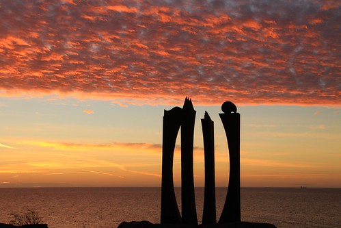 sculpture sunrise clouds orange horizon sweden landsortsweden