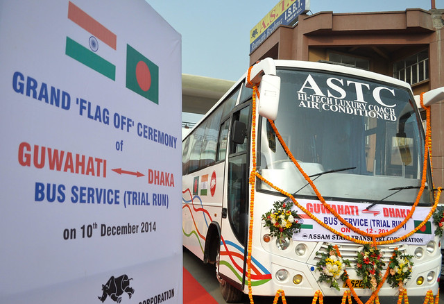 The bus before the maiden journey at Guwahati ISBT Shanmuddin (right) poses with another staff before the flag off of the journey at Guwahati ISBT