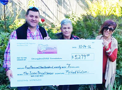 Michelle Michaels, his mother Gracie Watson and StringforaCURE executive director Elisa Guida with check from Breast Cancer Awareness Weekend