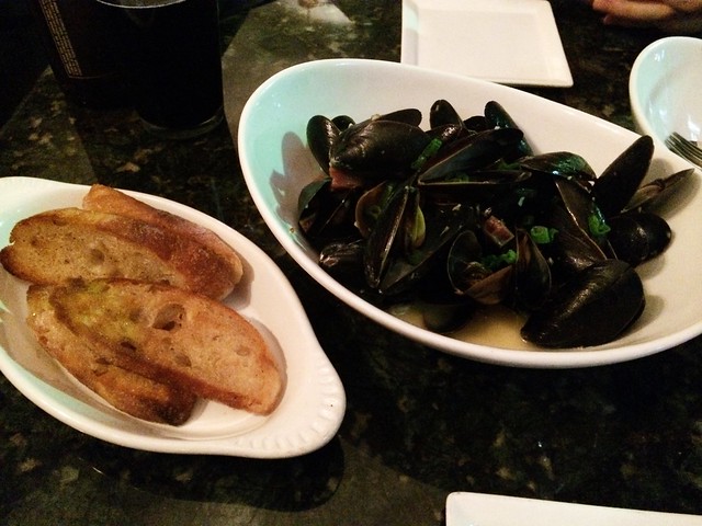 steamed PEI mussels with saffron coconut broth, chinese sausage, crostinis