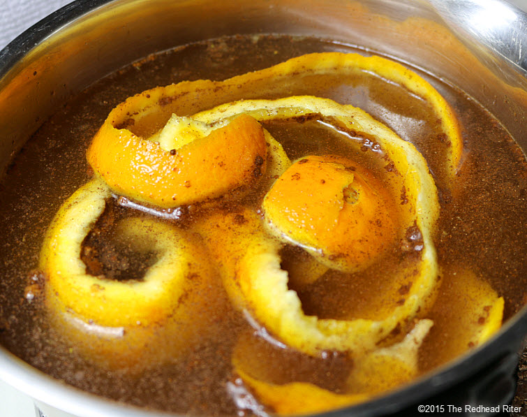 Fragrant Homemade Orange Potpourri Simmering On The Stove Top 6