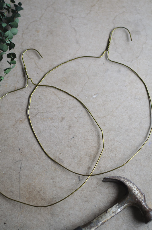 metal coat hangers hammered into wreath bases on juliettelaura.blogspot.com