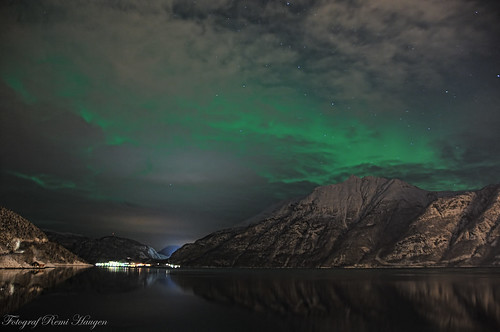 Aurora Borealis through the clouds.