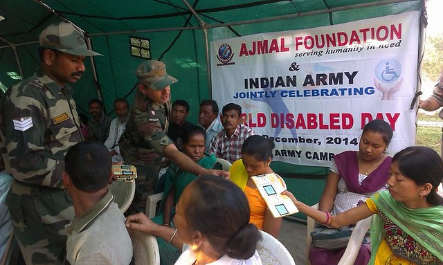 Armay personnel are seen distributing gifts to differently-abled persons during the observance of World Day of the Disabled at COB Deomornoi in Darrang district on Wednesday