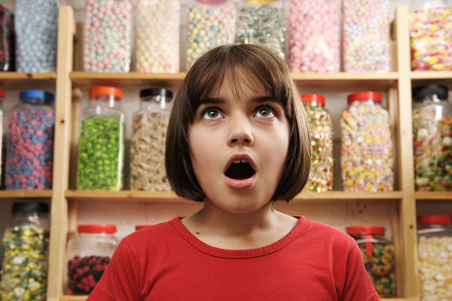 child in sweet shop