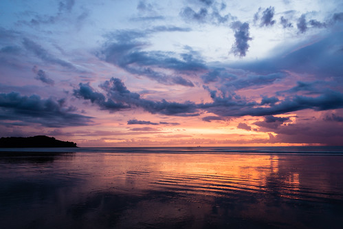 blue sunset orange sun reflection water yellow clouds thailand waves purple riple klongdao changwatkrabi tambonsaladan