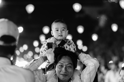Father and son. Cantho city, Vietnam. January 27, 2014